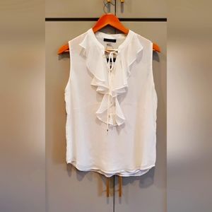 White ruffle sleeveless blouse